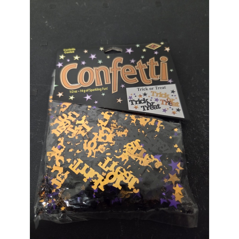 .5 Ounce Trick or Treat Confetti. Trick or Treat in Black and Orange with Black, Orange and Purple Stars.